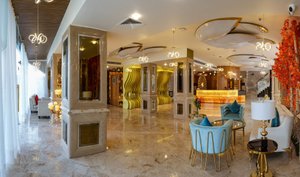 Hotel Clarks Premier, Kota in Kota, image may contain: Lighting, Dining Room, Dining Table, Shopping Mall
