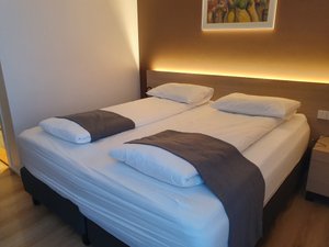 Hotel South Coast in Selfoss, image may contain: Furniture, Bed, Painting, Bedroom