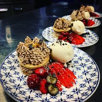 Milk chocolate mousse, banana compote, shortbread biscuit and ice cream.