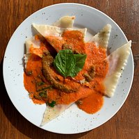 sweet potato and quinoa raviolis with a red sauce