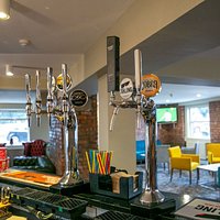 Bar with football in the background