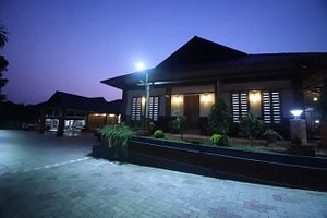 Green Planet Hotel in Velliyam Paramba, image may contain: Resort, Hotel, Villa, Plant