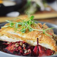 Filo pastry cheese pie served with two homemade deli salads