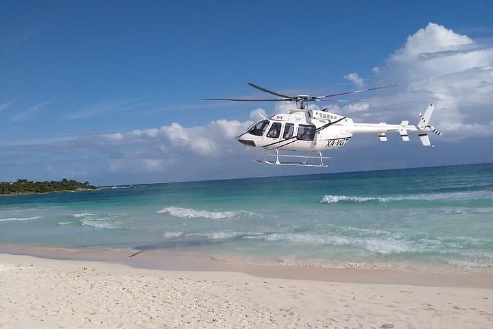 playa del carmen fly helicopter to oshkosh