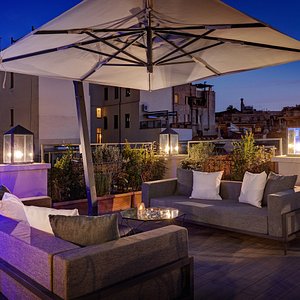 Dharma Boutique Hotel & Spa in Rome, image may contain: Couch, Furniture, Patio Umbrella, Patio