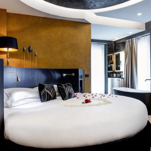 Dharma Boutique Hotel & Spa in Rome, image may contain: Couch, Furniture, Patio Umbrella, Patio