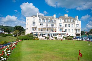 The Belmont Hotel in Sidmouth, image may contain: Grass, Hotel, Lawn, Housing