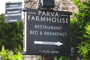 Parva Farmhouse in Tintern, image may contain: Sign, Symbol, Plaque