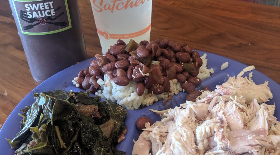 Pulled chicken with red beans and rice and collard greens....now that is some home-cooking! 
