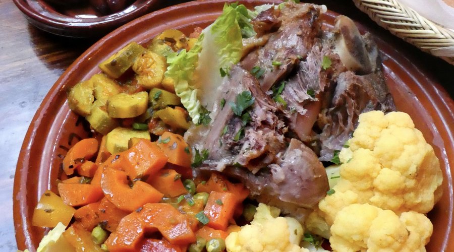 Leg of lamb served with assorted vegetables