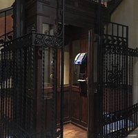 Old elevator is now a phone booth