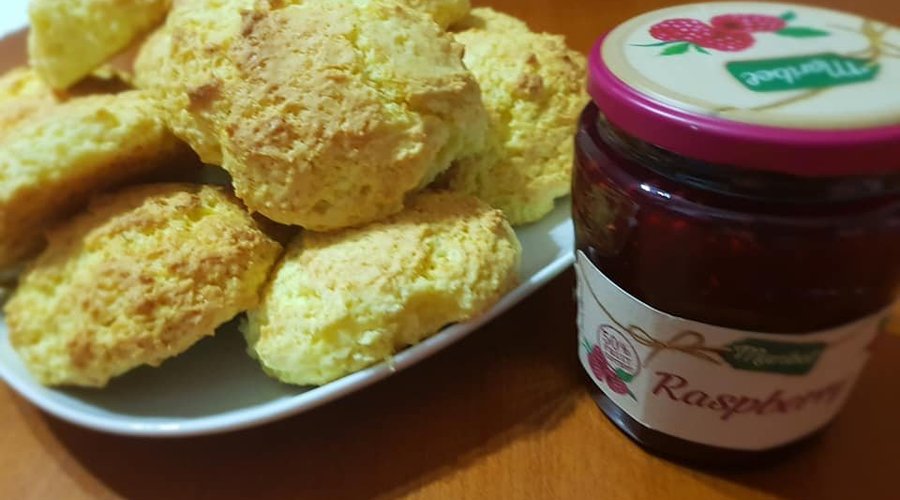 Enjoy some freshly baked scones served with jam & cream