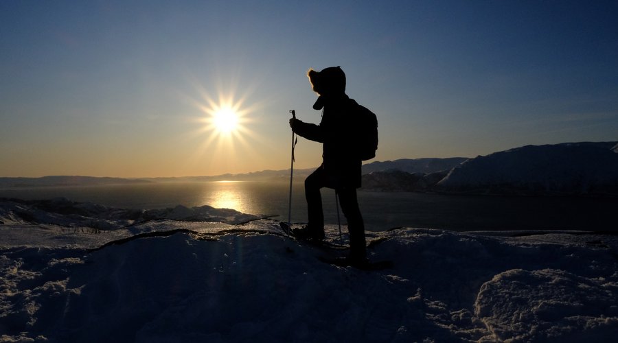 Snowshoeing to the sun