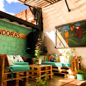 Patio with BBQ. We are eco-friendly, in that black tank, we keep rainwater.