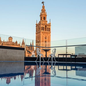 Hotel Casa 1800 Sevilla in Seville, image may contain: Bell Tower, Tower, Clock Tower, City