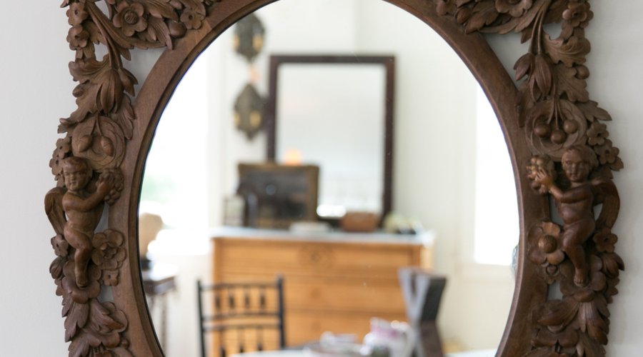 Also we carry beautiful mirrors like this carved walnut French mirror!
