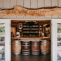 Welcome to our cozy tasting room. It's barrels of fun in there;)