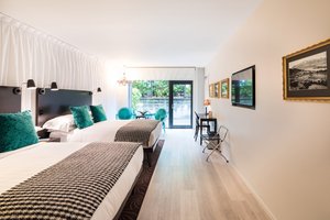 Queenstown Park Boutique Hotel in Queenstown, image may contain: Dorm Room, Bedroom, Furniture, Home Decor