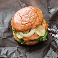 The condiments increase the size of an already-large burger from brgrz!
