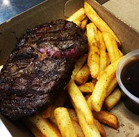 Steak & chips, yum! Comes with a salad & your choice of sauce.