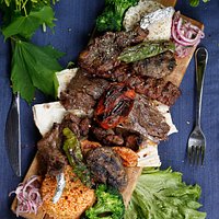 Mixed Grill - Exclusive
Doner, lamb sis, adana kebab, meat balls, chicken sis served with rice pilaf and salad.