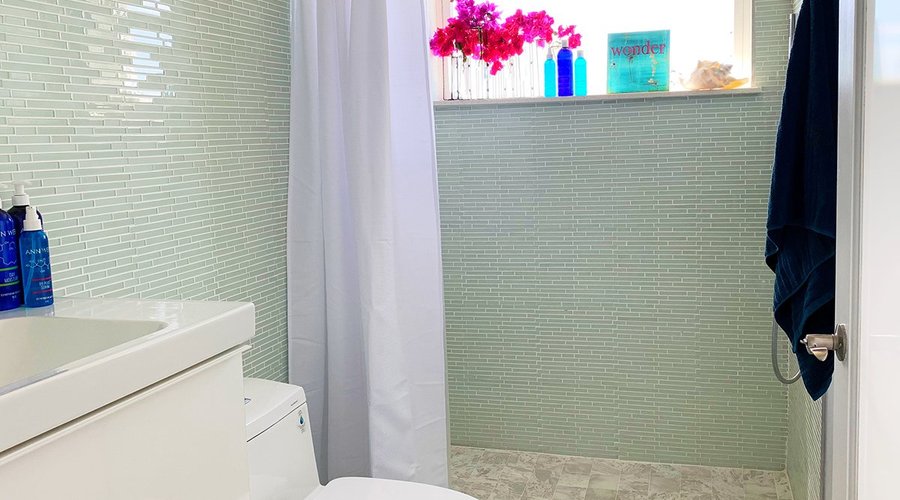 Our casita bathrooms feature beautiful floor to ceiling tile.