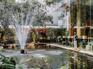Shangri-La Kuala Lumpur in Kuala Lumpur, image may contain: Fountain, Water, Architecture, Person