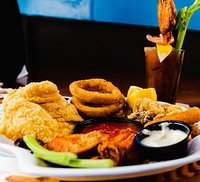 Loaded Bloody Mary Topped With Hot Wing