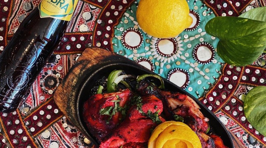 Tandoori Chicken with a cobra beer on the side