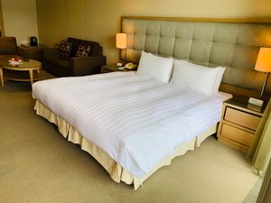 Hotel Del Lago in Yuchi, image may contain: Furniture, Couch, Home Decor, Bed