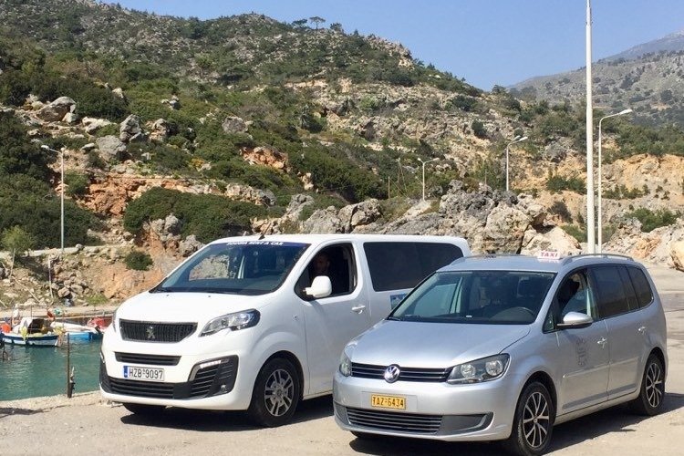 Our minivan in Sougia's port.  Our company offers proffesional taxi and minivan transfers on West Crete (Chania, Sougia, Omalos, Agia Irini and more). Always polite and professional, with our brand new vehicles, we keep having happy customers that enjoy our transfer services.