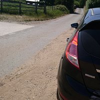 Narrow lane, little parking opportunity, over bridge to museum (when open)