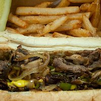 PHILLY CHEESESTEAK SUPREME
Steak, Grilled Onions, Green Peppers, Mushrooms & Your Choice of Cheese