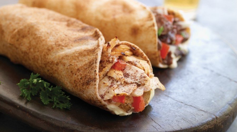 Our trademark chicken and beef shawarma wraps served since 1983.