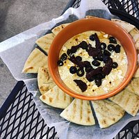 Our delicious Ultimate Hummus served with Pita Chips.