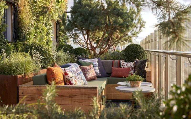Outdoor terrace at The Nest rooftop lounge