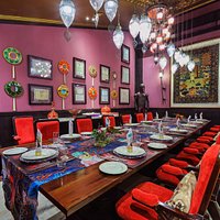 Sultan Room, from which walls are actual pieces of history from the empire that can
inspire conversations during your meal such as a 300 years old Ottoman carpet, 19th Century
Persian Armor, and actual bank bonds from the early years of Turkey. Painted in royal purple and
inspired by the blue mosque, guests are invited to truly experience the exclusive way of Ottoman
dining in this room. This room can accommodate up to 14 people.