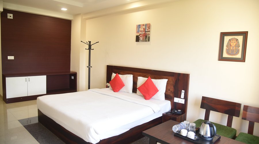 Deluxe Room - Comfortable Big clean Rooms for your comfort situated in Infocity close to KIMS and LV Prasad Eye Hospital.