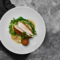 Chicken with spring onions, porcini sauce and croquettte