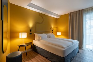 HT Hotel Trieste in Gradisca d'Isonzo, image may contain: Corner, Lighting, Lamp, Interior Design