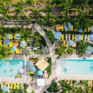 Lounge under a colorful cabana or bungalow at one of our two heated outdoor pools— including an adult-only pool. Poolside service includes a personal attendant so you can bask in the sunshine with specialty cocktails and casual cuisine.