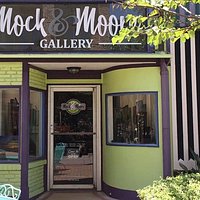 Mock & Moore Gallery storefront, 2215 Postoffice St. featuring original oil paintings by Shawne Moore and handcrafted sterling silver jewelry with unique stones by Karla Mock.