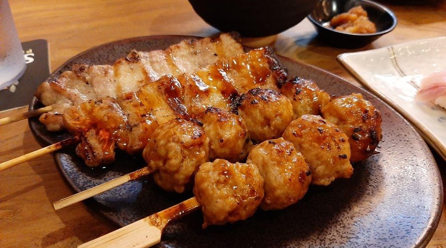 Meatball and pork belly skewers
