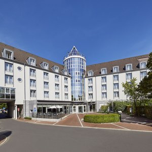 Lindner Hotel Airport in Düsseldorf, image may contain: Interior Design, Home Decor, Furniture, Corner