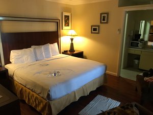 Townsend Gateway Inn in Townsend, image may contain: Lamp, Furniture, Bed, Microwave