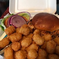 Cajun chicken sandwich with tots