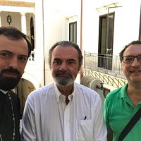 Io, mio cognato Protosinghel Corneliu ed al centro il Barone Bertolino.