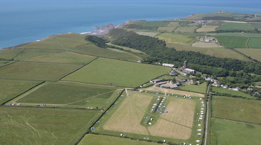 Aerial view of campsite with Lundy Island on the horizon