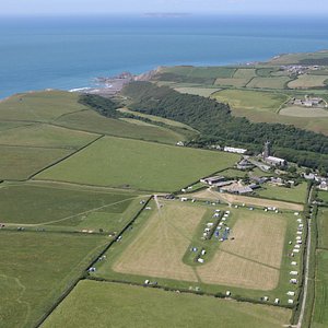 Aerial view of campsite with Lundy Island on the horizon