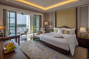 Mia Saigon Luxury Boutique Hotel in Ho Chi Minh City, image may contain: Home Decor, Bed, Furniture, Door